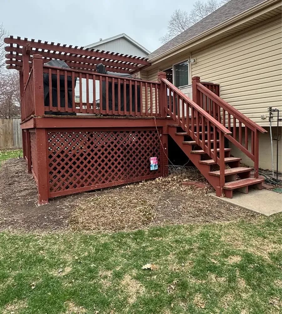 Complete backyard transformation — bare dirt turned into sod, rock beds, and sprinklers, one crew start to finish.